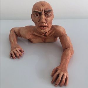 Handmade and painted polymer clay sculpture.